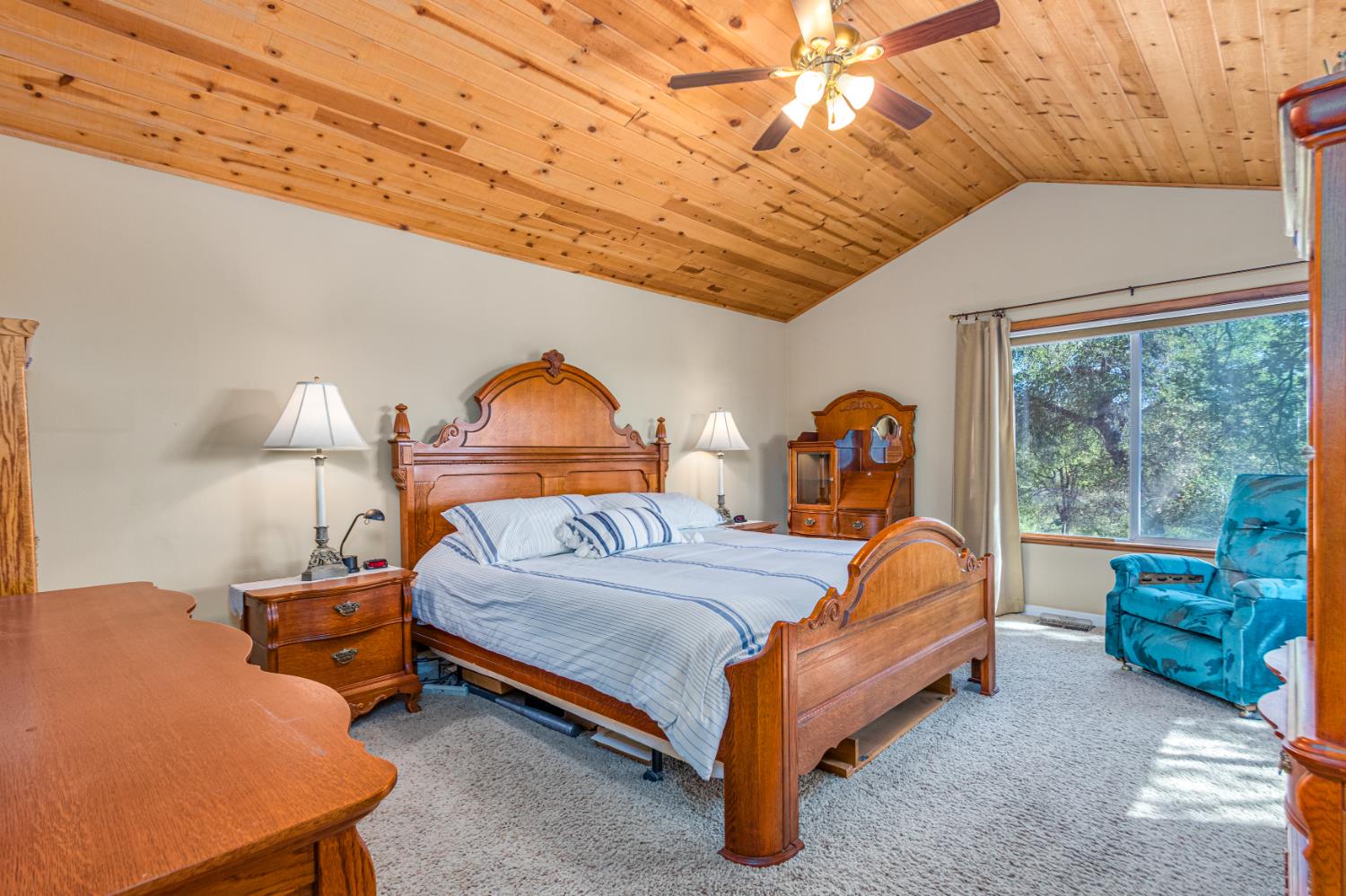 9290 Cramer Road Auburn, CA 95602 - Photo 24 of 67 a bedroom with a bed and a window