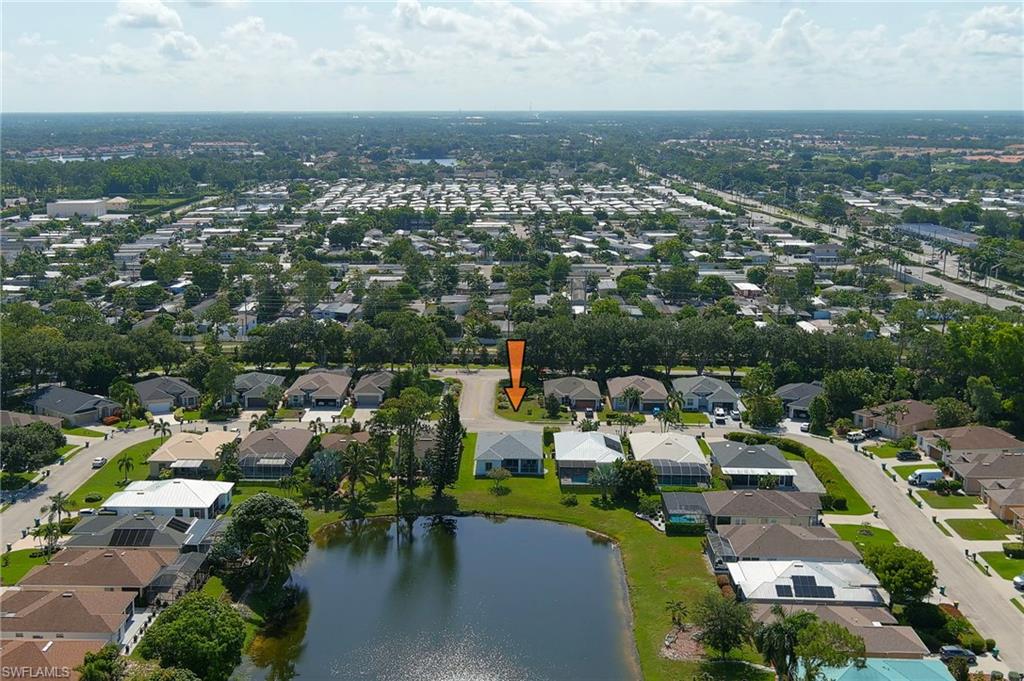 223 Stanhope Circle Naples, FL 34104 - Photo 33 of 41 Aerial perspective showcasing a residential area with varied home styles and mature landscaping