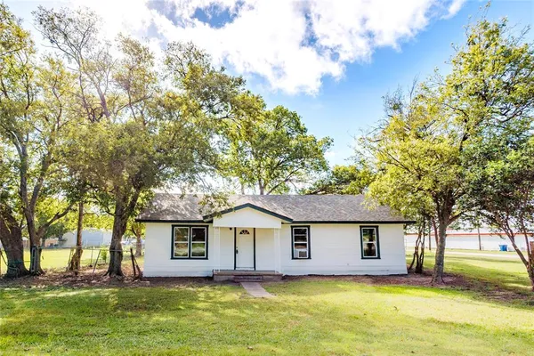 a house view with a garden space
