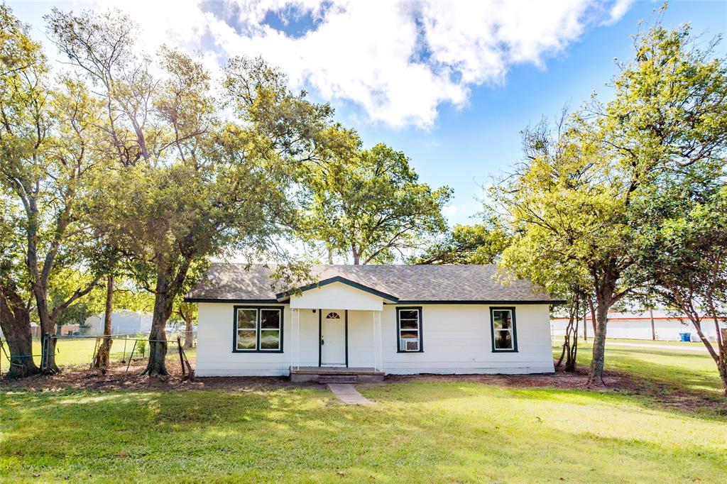 a house view with a garden space