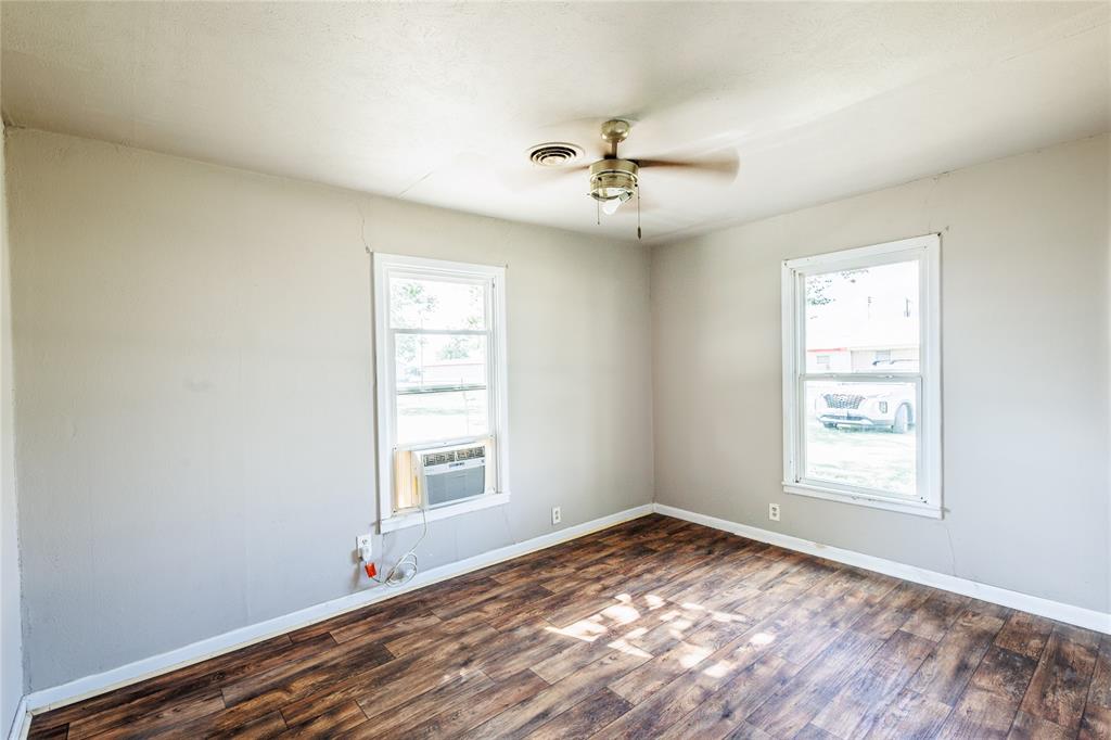 202 North Sycamore Malone, TX 76660 - Photo 16 of 22 a view of empty room with windows