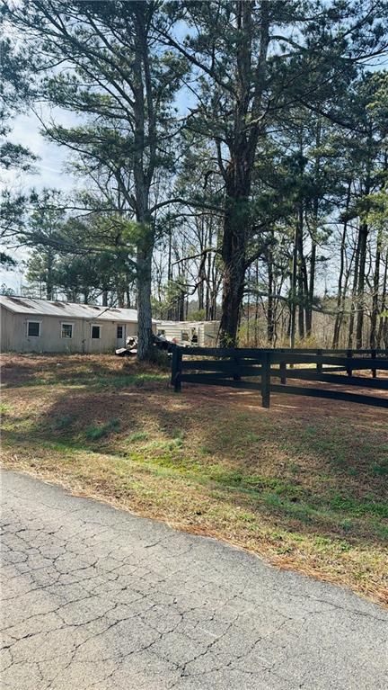 508 McKibben Road Buchanan, GA 30113 - Photo 3 of 13 a view of pool with trees