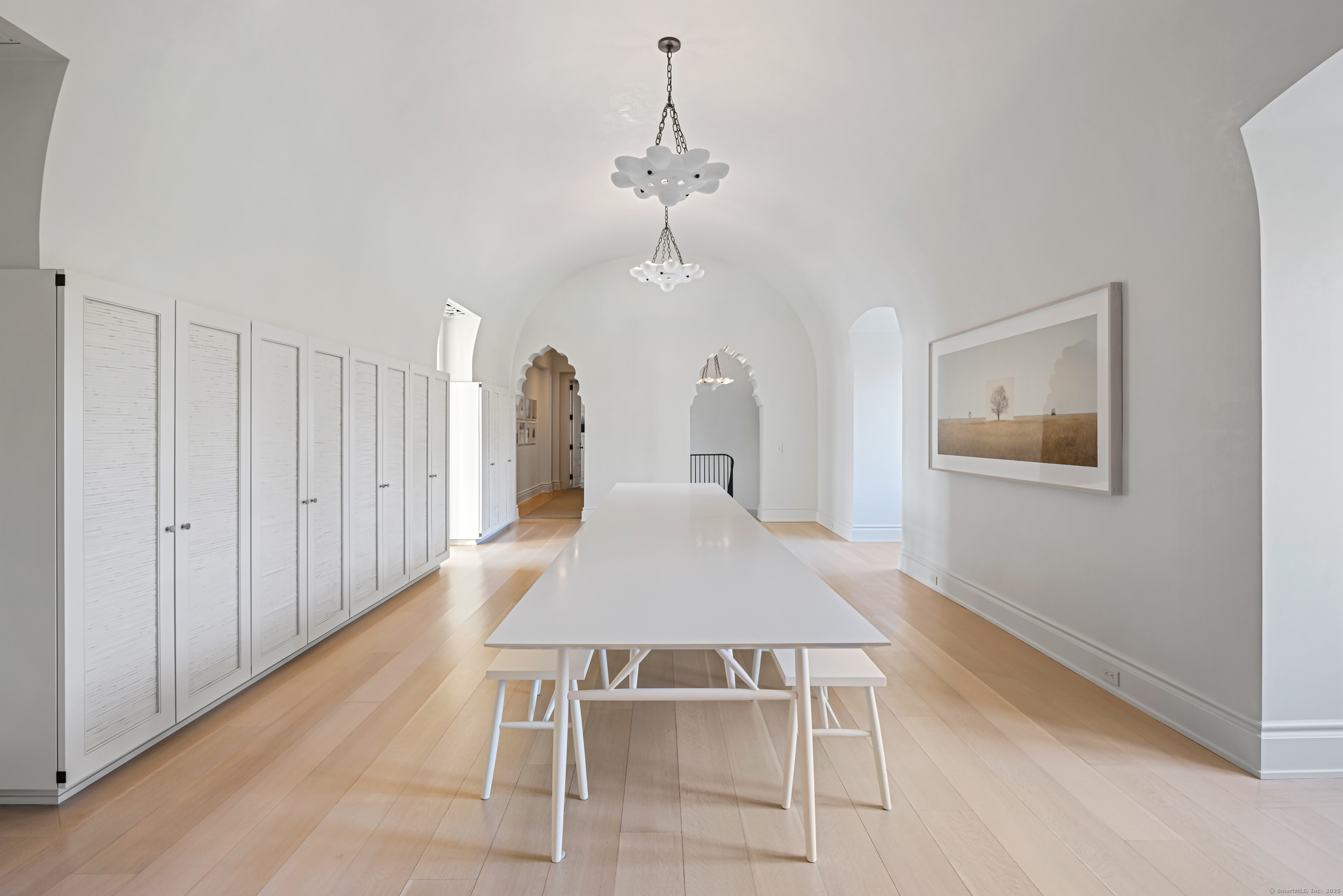 1131 Sasco Hill Road Fairfield, CT 06824 - Photo 22 of 40 a very nice looking dining room with a table and chairs