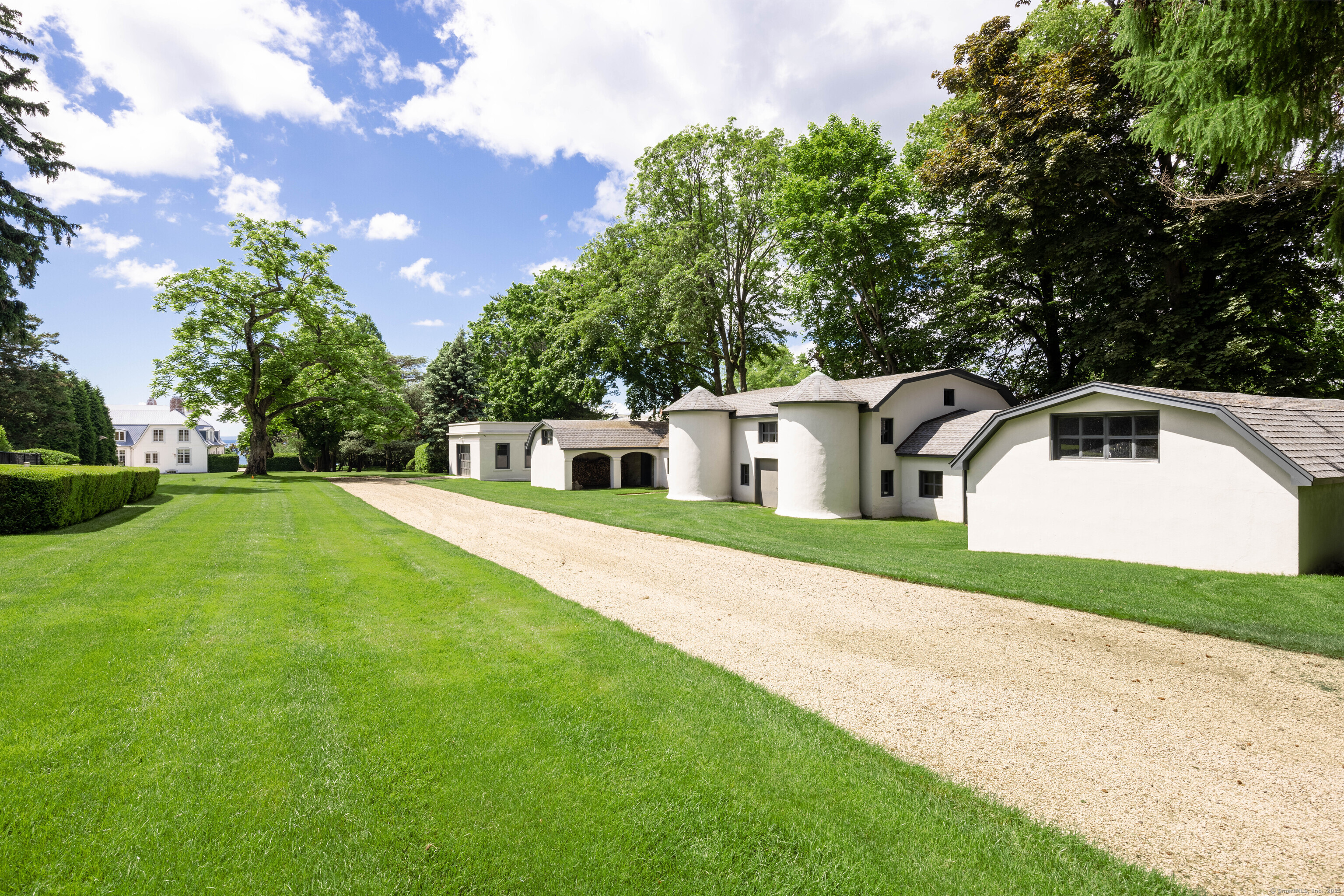 1131 Sasco Hill Road Fairfield, CT 06824 - Photo 35 of 40 a front view of a house with yard