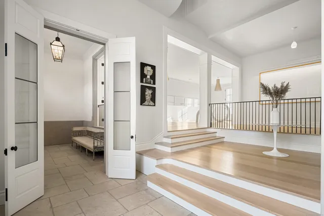 a view of an empty room and bathroom