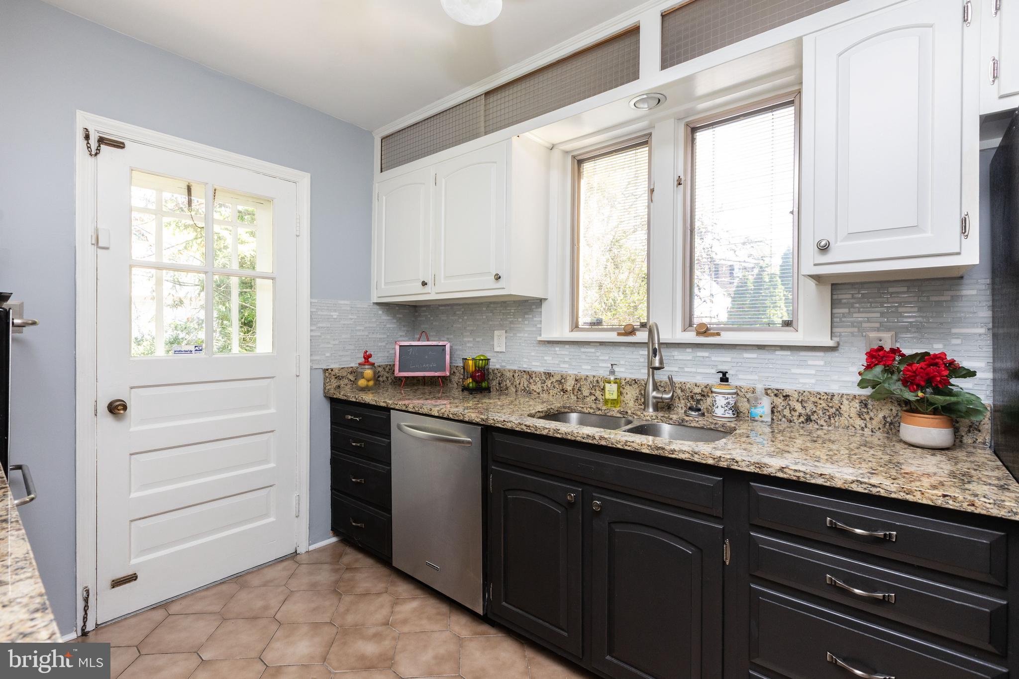 5507 Springlake Way Baltimore, MD 21212 - Photo 12 of 46 Kitchen has side door access