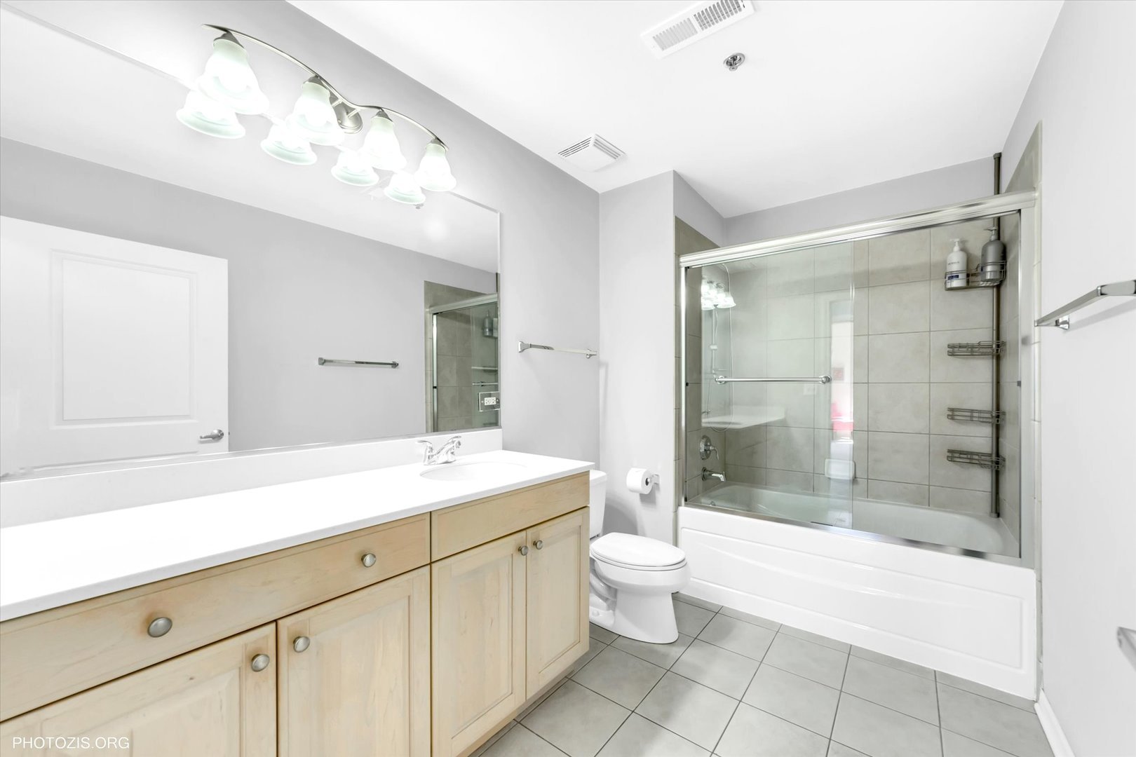 1199 East Port Clinton Road, Unit 201 Vernon Hills, IL 60061 - Photo 8 of 19 a spacious bathroom with a shower sink vanity mirror and bathtub