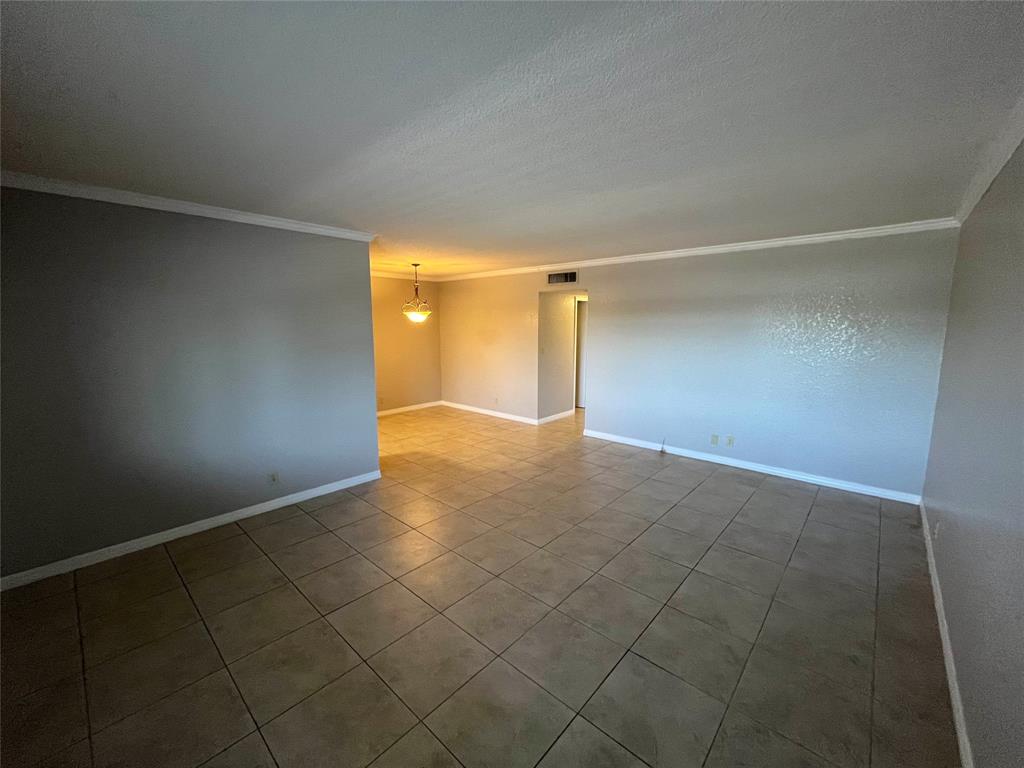 2020 Northeast 56th Street, Unit 208 Fort Lauderdale, FL 33308 - Photo 13 of 54 a view of an empty room