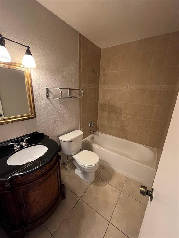 2020 Northeast 56th Street, Unit 208 Fort Lauderdale, FL 33308 - Photo 36 of 54 a bathroom with a granite countertop sink toilet a mirror and shower
