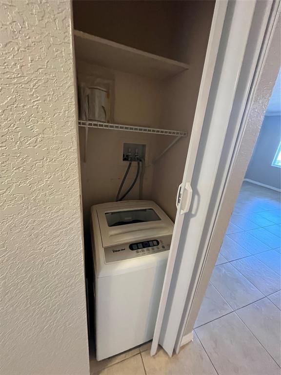 2020 Northeast 56th Street, Unit 208 Fort Lauderdale, FL 33308 - Photo 39 of 54 a utility room with dryer and washer