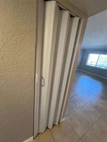 a view of a room with racks on the wall