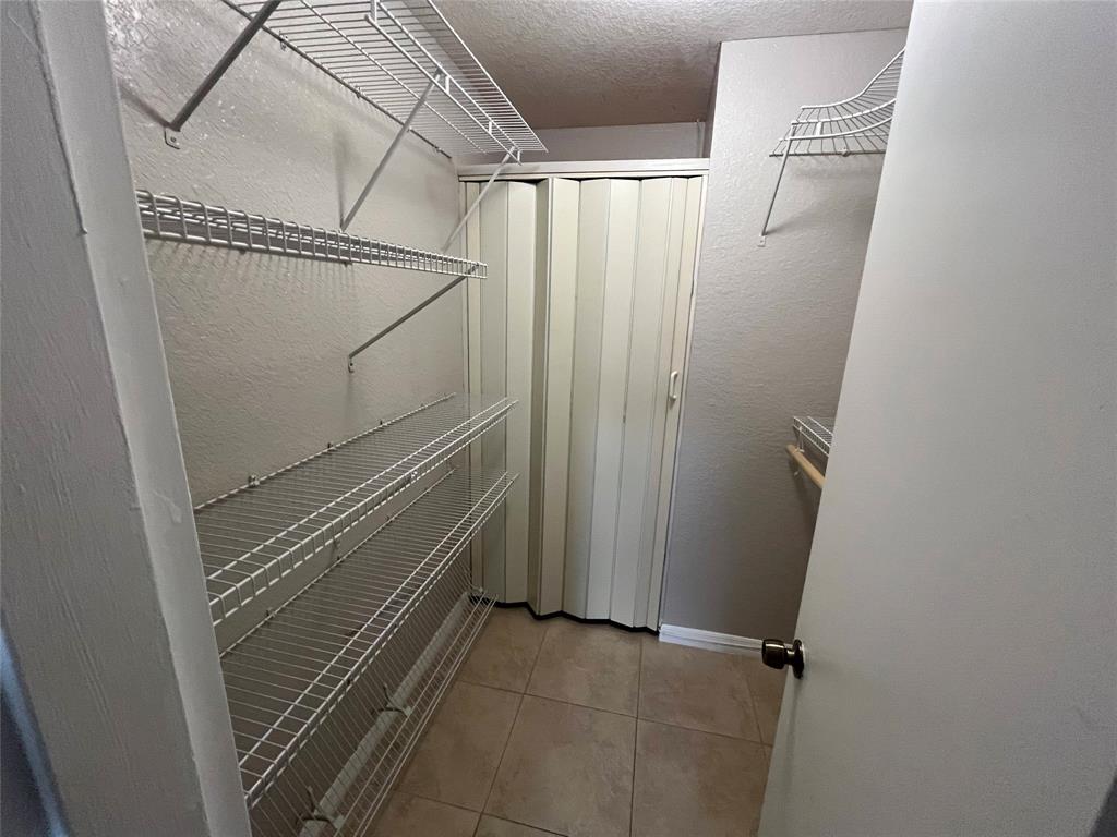 2020 Northeast 56th Street, Unit 208 Fort Lauderdale, FL 33308 - Photo 41 of 54 a bathroom with a shower