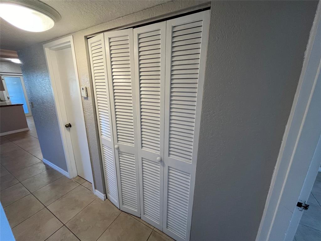2020 Northeast 56th Street, Unit 208 Fort Lauderdale, FL 33308 - Photo 44 of 54 a view of a bathroom with a sink