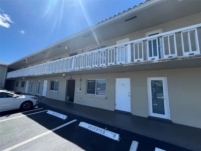 a car parked in front of a house