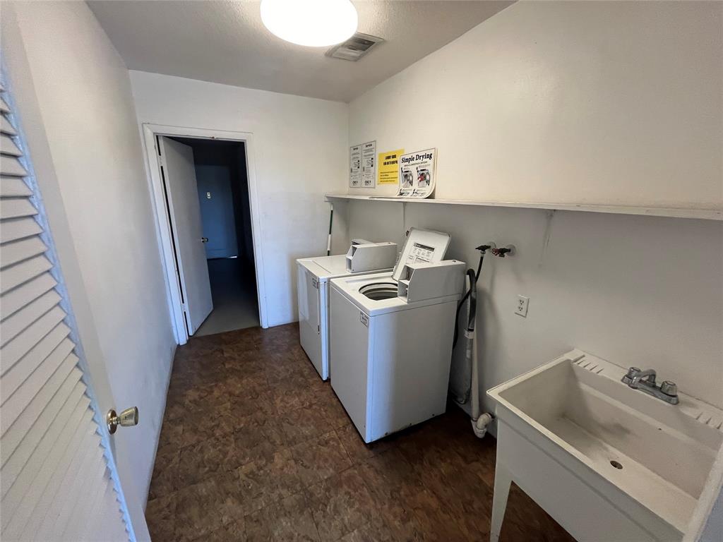 2020 Northeast 56th Street, Unit 208 Fort Lauderdale, FL 33308 - Photo 50 of 54 a utility room with dryer and washer