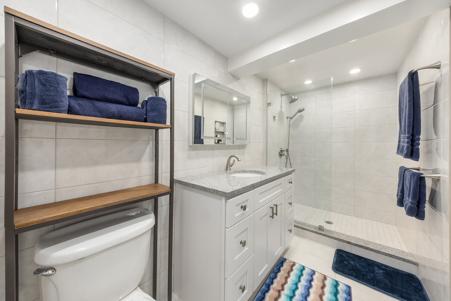 135 West 70th Street, Unit 6M Manhattan, NY 10023 - Photo 10 of 11 a bathroom with a sink a toilet and shower