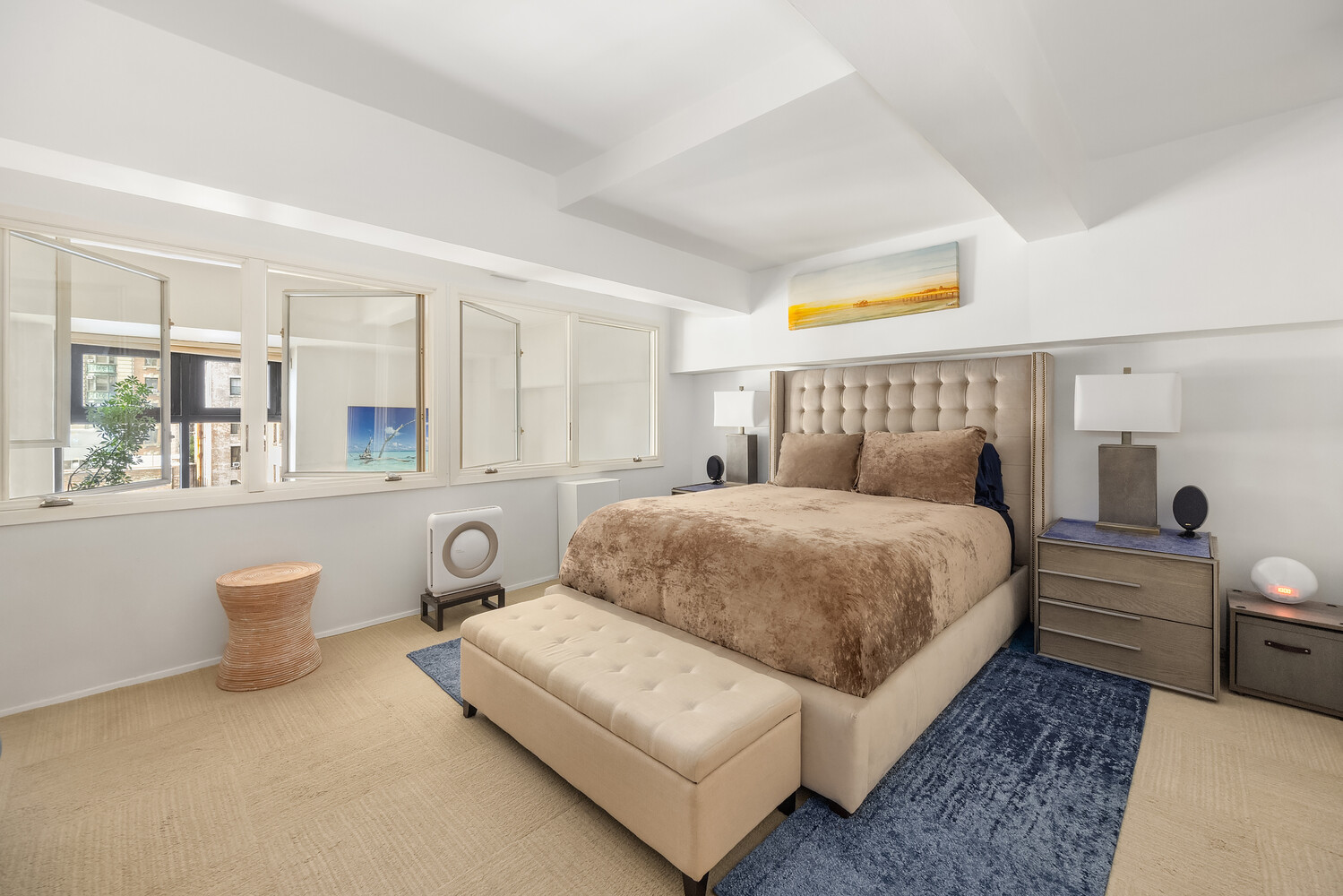 135 West 70th Street, Unit 6M Manhattan, NY 10023 - Photo 7 of 11 a spacious bedroom with a bed and a large window