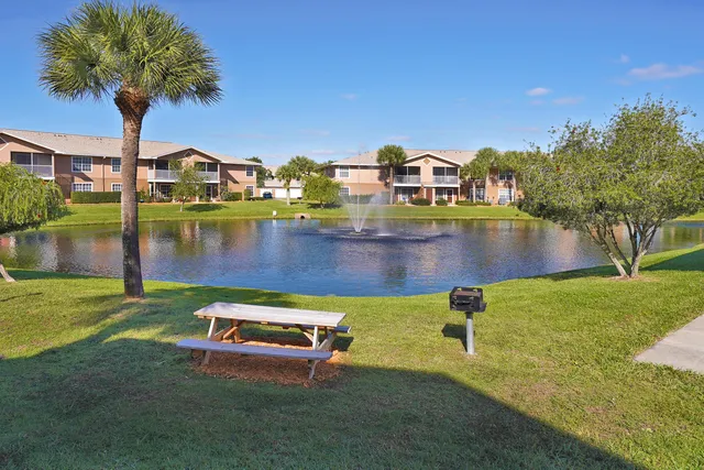 a view of a lake with a big yard