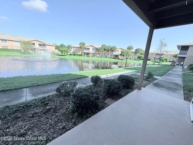 a view of a garden with a lake
