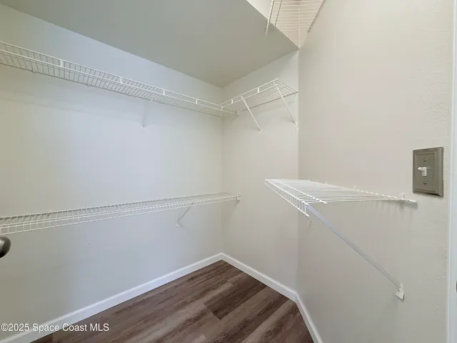 a view of small space with racks on the wall