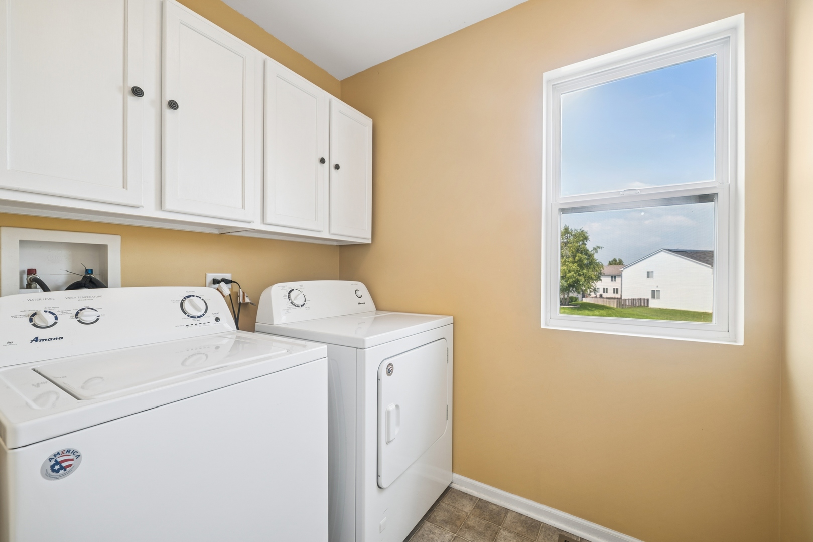 560 Canterbury Lane Pingree Grove, IL 60140 - Photo 12 of 15 a utility room with dryer and washer