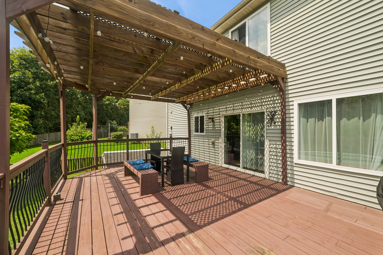 560 Canterbury Lane Pingree Grove, IL 60140 - Photo 14 of 15 a view of a patio on the deck