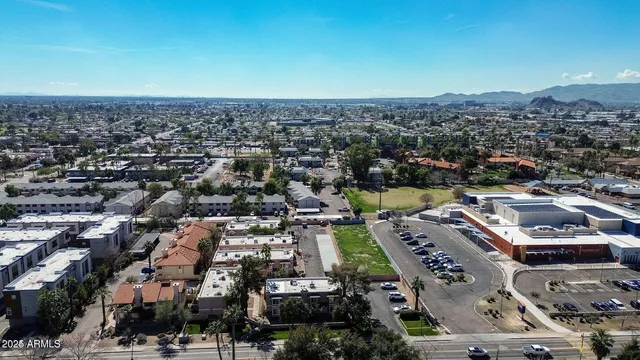 a view of a street with houses