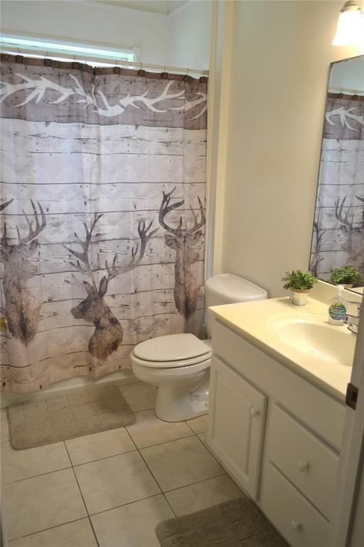 400 South Co Road 115 Bunnell, FL 32110 - Photo 13 of 26 a bathroom with a granite countertop toilet and a sink