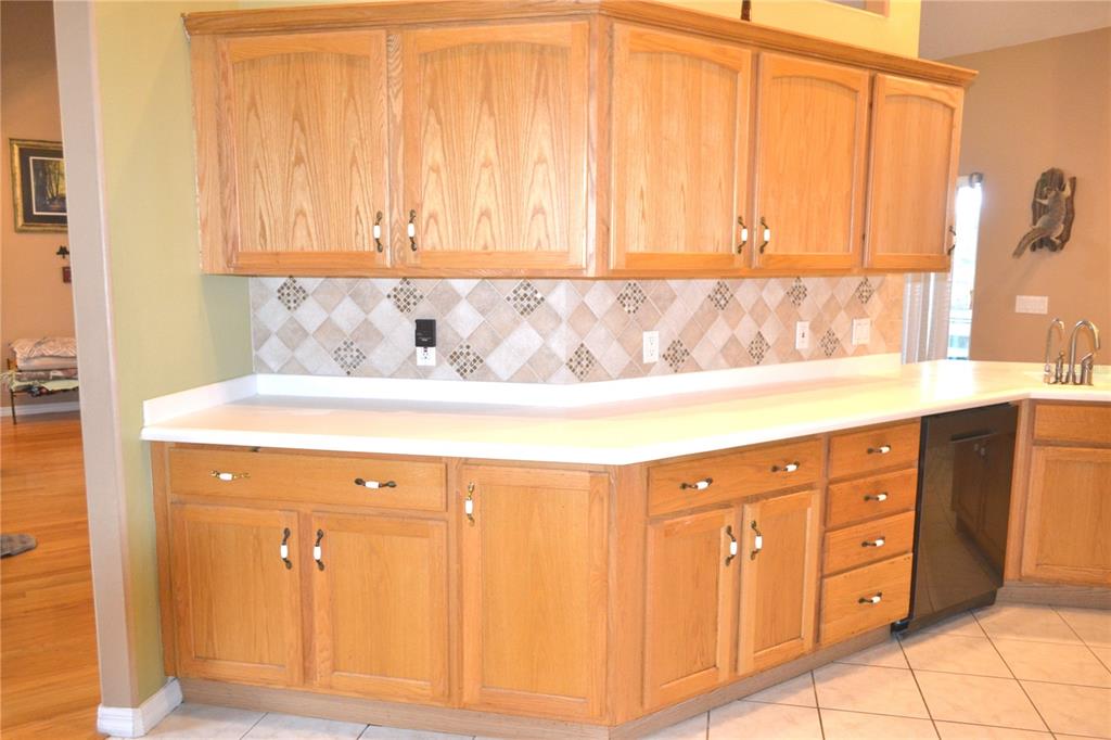 400 South Co Road 115 Bunnell, FL 32110 - Photo 17 of 26 a bathroom with a sink and a mirror