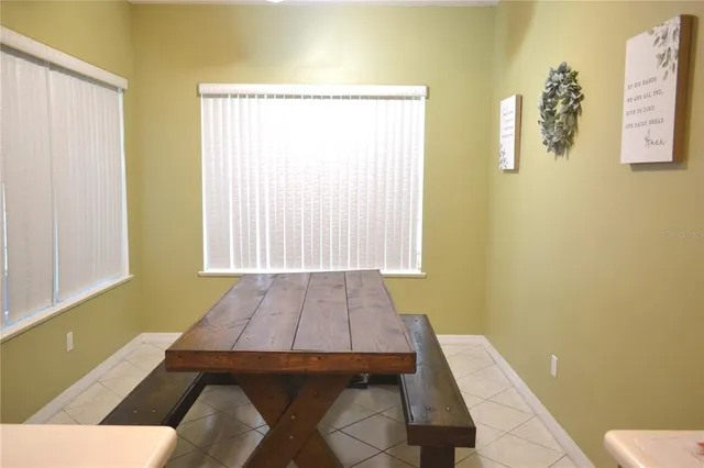 a room with a bed and a window