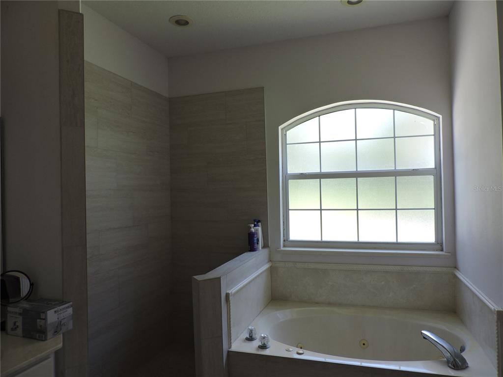 400 South Co Road 115 Bunnell, FL 32110 - Photo 10 of 26 an empty room with a window