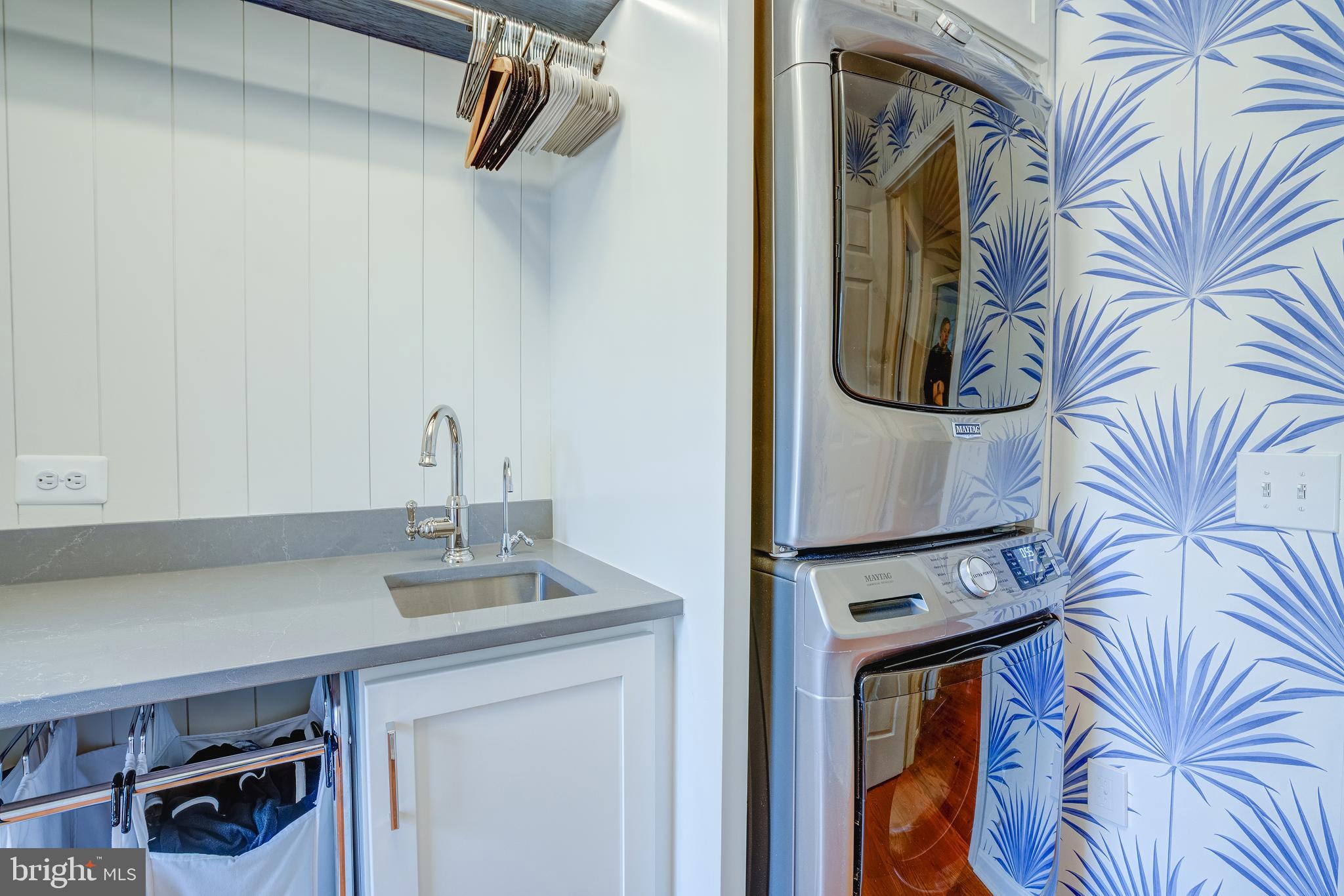 8529 High Timber Court Ellicott City, MD 21043 - Photo 60 of 94 a bathroom with a sink and a mirror