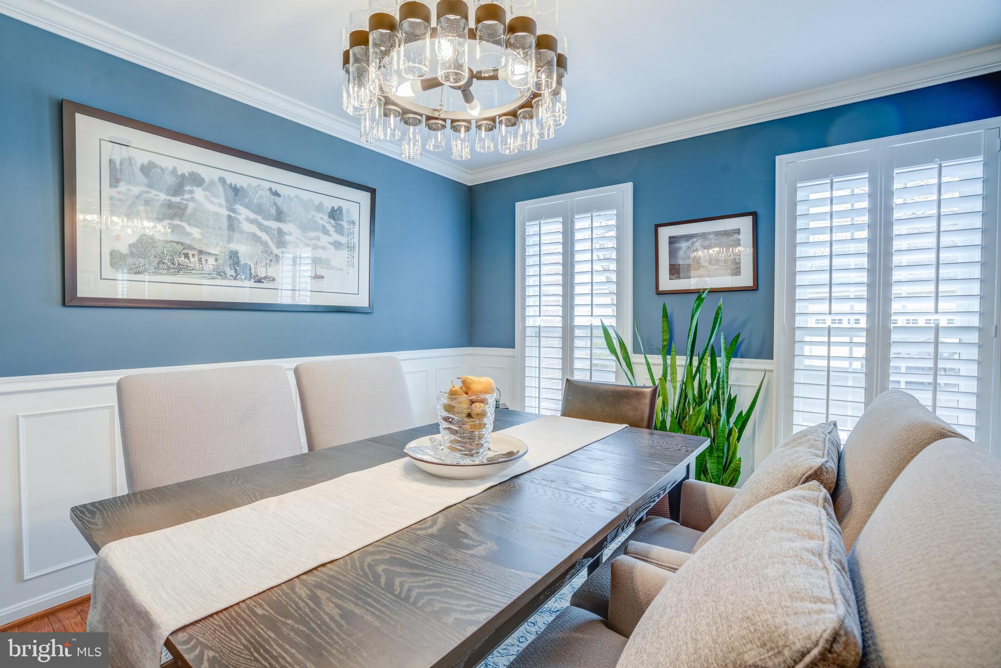 8529 High Timber Court Ellicott City, MD 21043 - Photo 8 of 94 a view of a dining room with furniture window and wooden floor