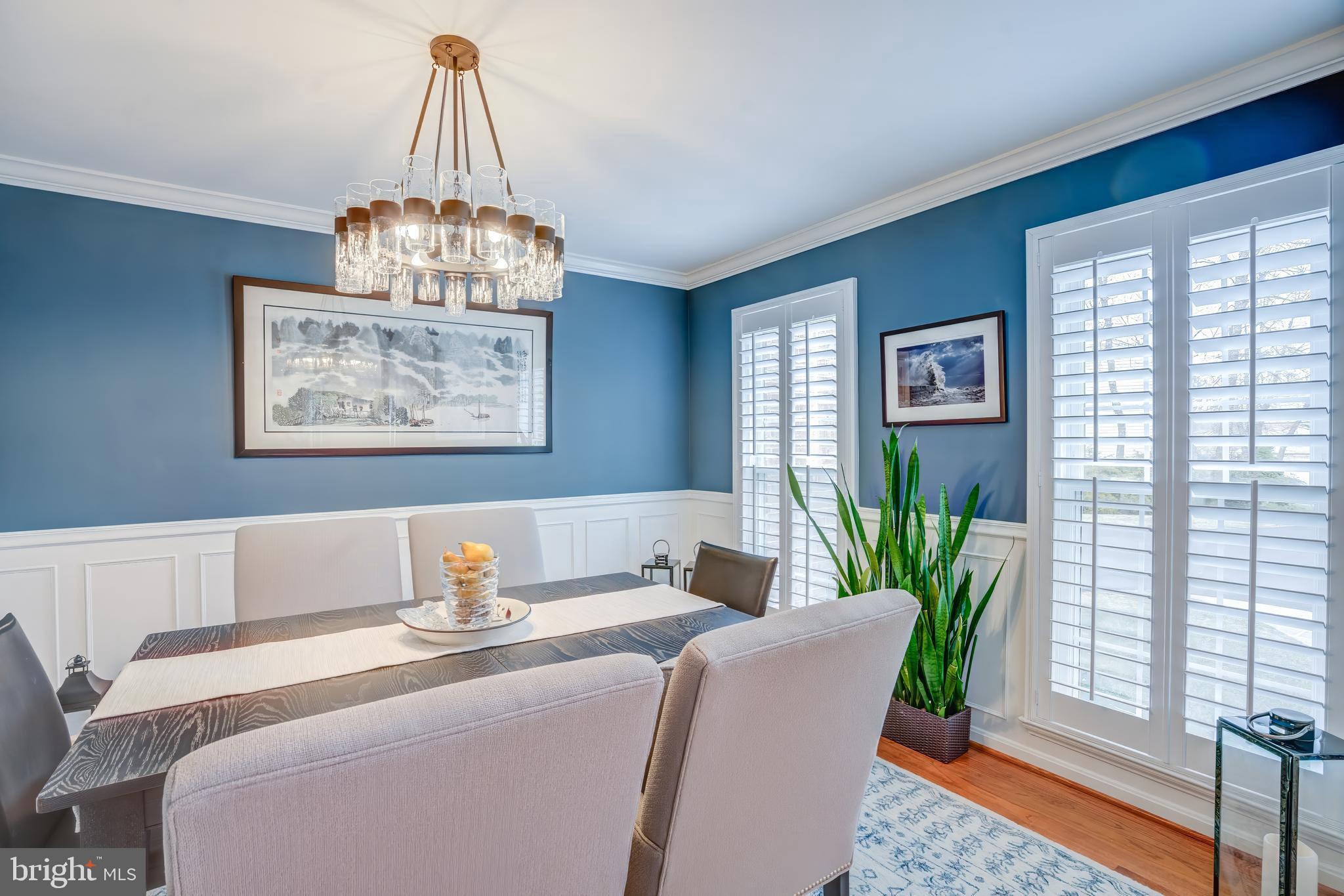 8529 High Timber Court Ellicott City, MD 21043 - Photo 9 of 94 a living room with furniture and a chandelier