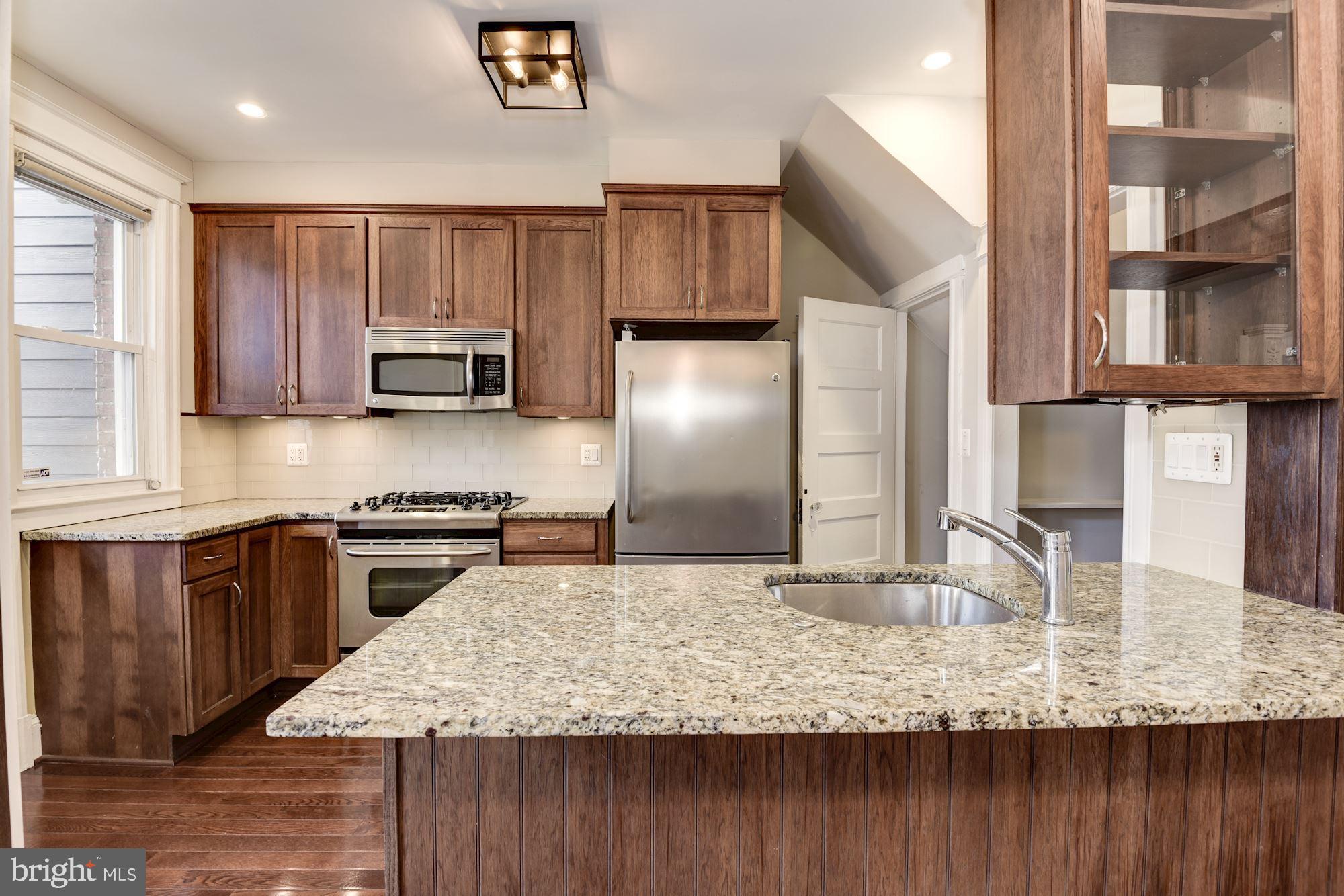 1227 Park Road Northwest Washington, DC 20010 - Photo 13 of 30 Tastefully designed gourmet kitchen