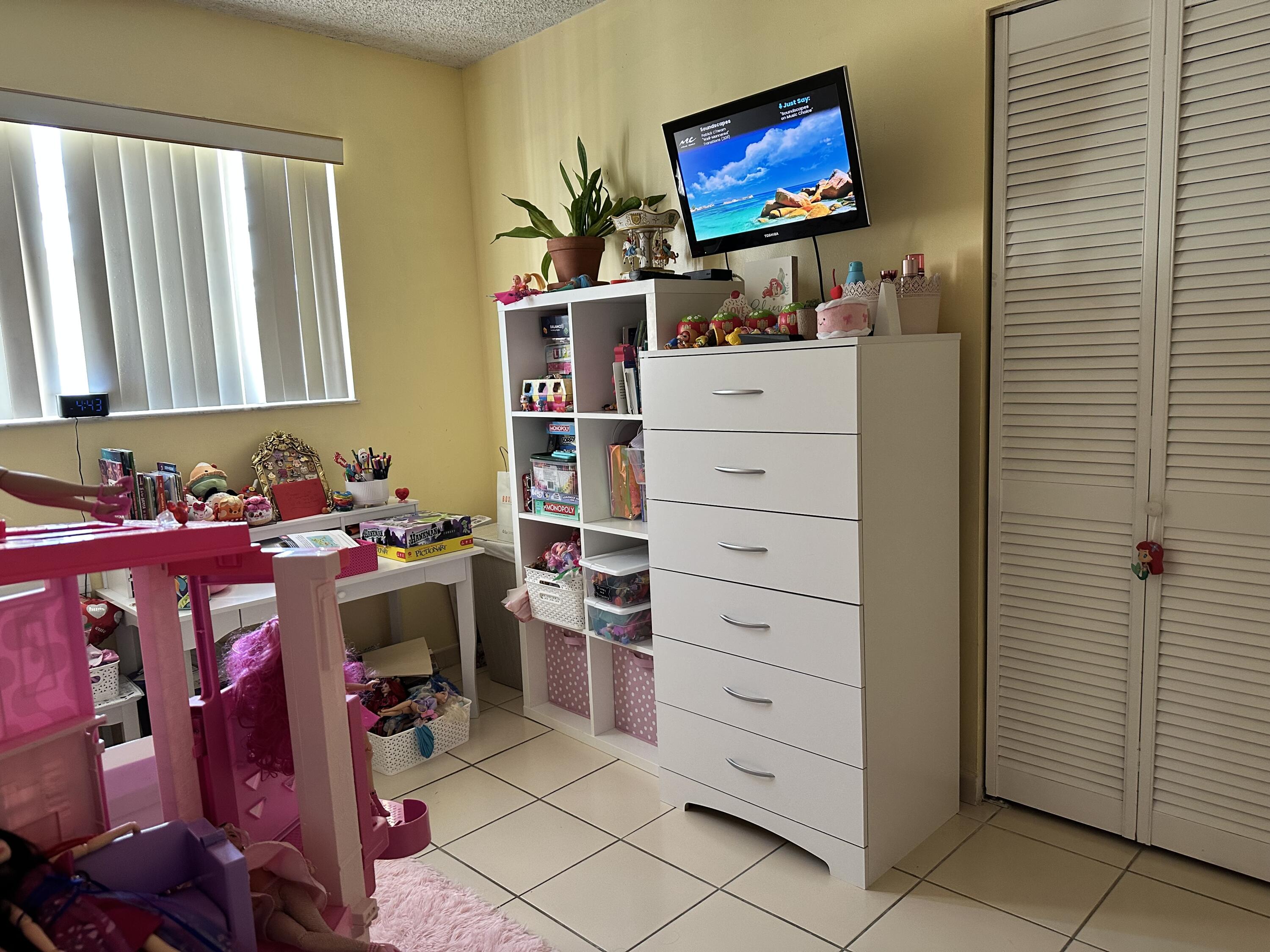 7960 Northwest 174th Street Hialeah, FL 33015 - Photo 18 of 22 a room with storage and utility