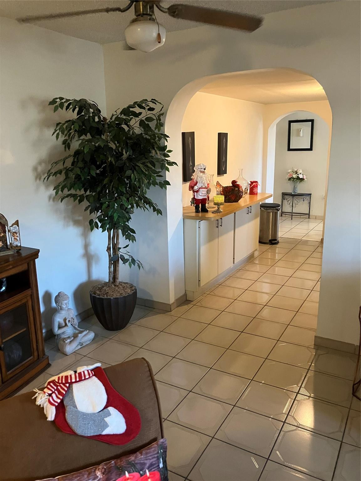 7960 Northwest 174th Street Hialeah, FL 33015 - Photo 5 of 22 a living room with furniture and a potted plant