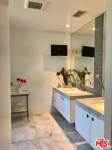 a view of entryway with stairs and wooden floor