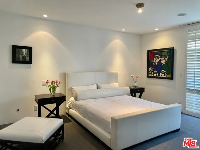 a room with furniture and a wooden floor