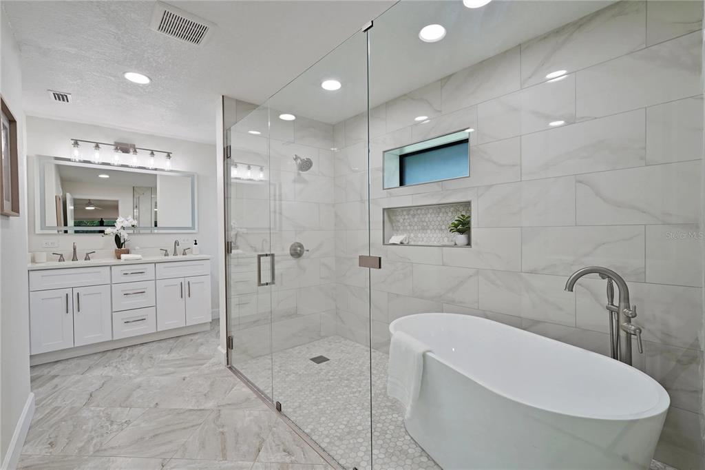 5012 South Deepwater Point Homosassa, FL 34448 - Photo 14 of 42 a bathroom with a sink a toilet and shower