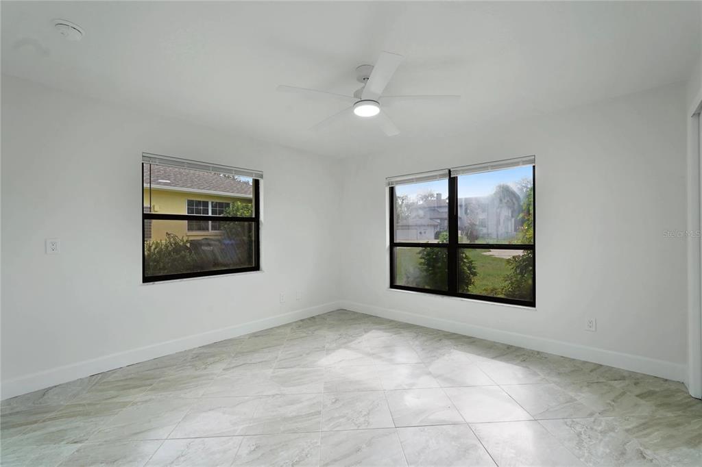 5012 South Deepwater Point Homosassa, FL 34448 - Photo 19 of 42 an empty room with a window