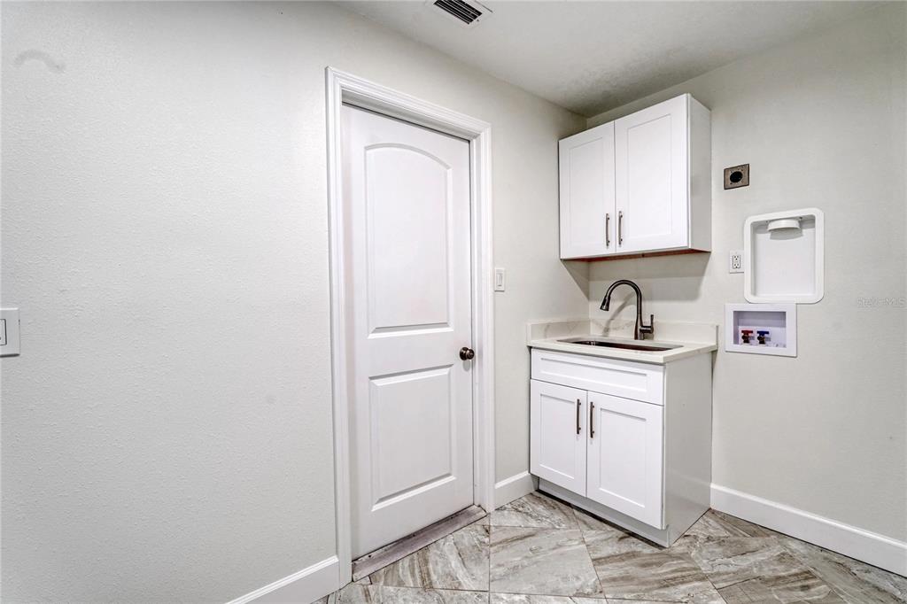 5012 South Deepwater Point Homosassa, FL 34448 - Photo 21 of 42 a room with storage and utility