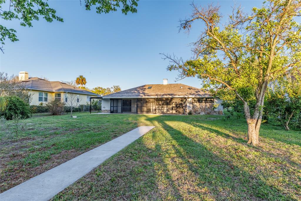 5012 South Deepwater Point Homosassa, FL 34448 - Photo 26 of 42 a view of a house with a yard