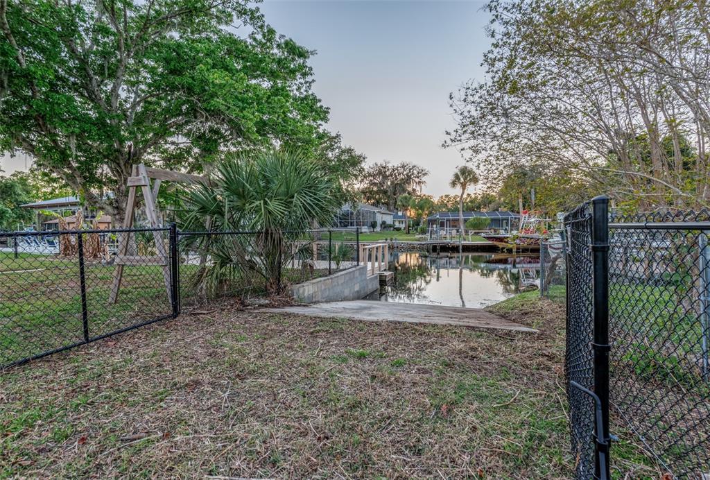5012 South Deepwater Point Homosassa, FL 34448 - Photo 27 of 42 a view of a backyard with large trees
