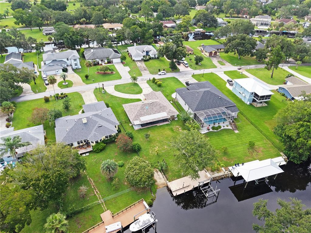 5012 South Deepwater Point Homosassa, FL 34448 - Photo 33 of 42 an aerial view of residential houses with outdoor space and parking
