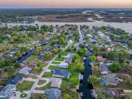 an aerial view of a house with a garden