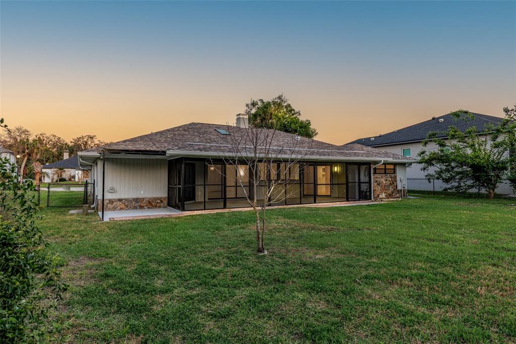 5012 South Deepwater Point Homosassa, FL 34448 - Photo 4 of 42 a view of a house with a yard and a garden