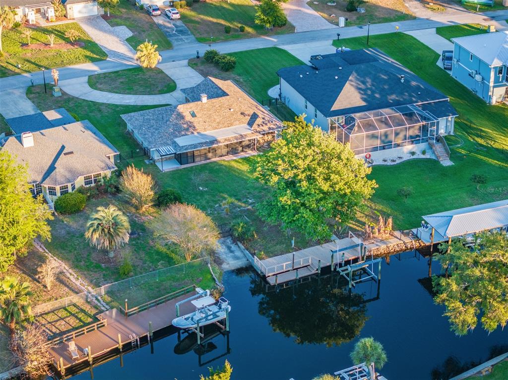 5012 South Deepwater Point Homosassa, FL 34448 - Photo 42 of 42 an aerial view of a house with a garden