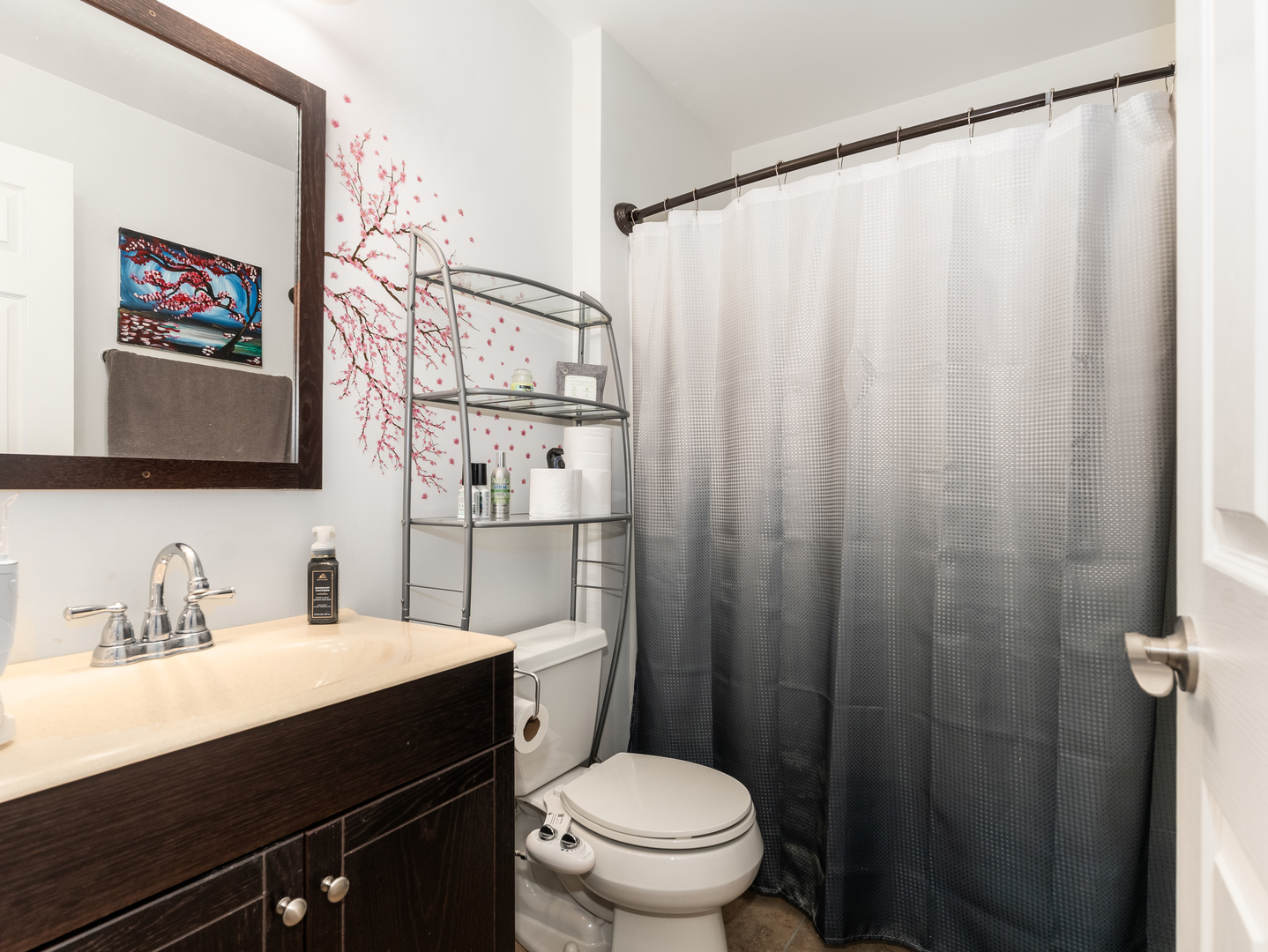 1923 Waters Edge Drive Minooka, IL 60447 - Photo 17 of 24 a bathroom with a sink a toilet and shower curtain