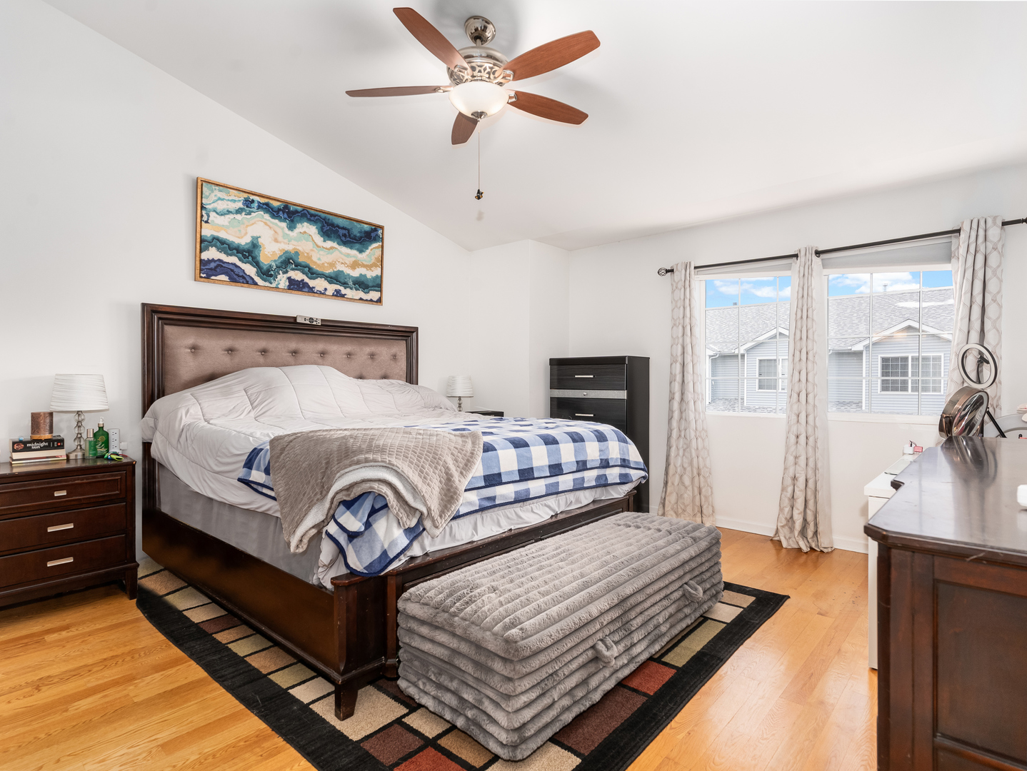 1923 Waters Edge Drive Minooka, IL 60447 - Photo 23 of 24 a bedroom with a bed and wooden floor